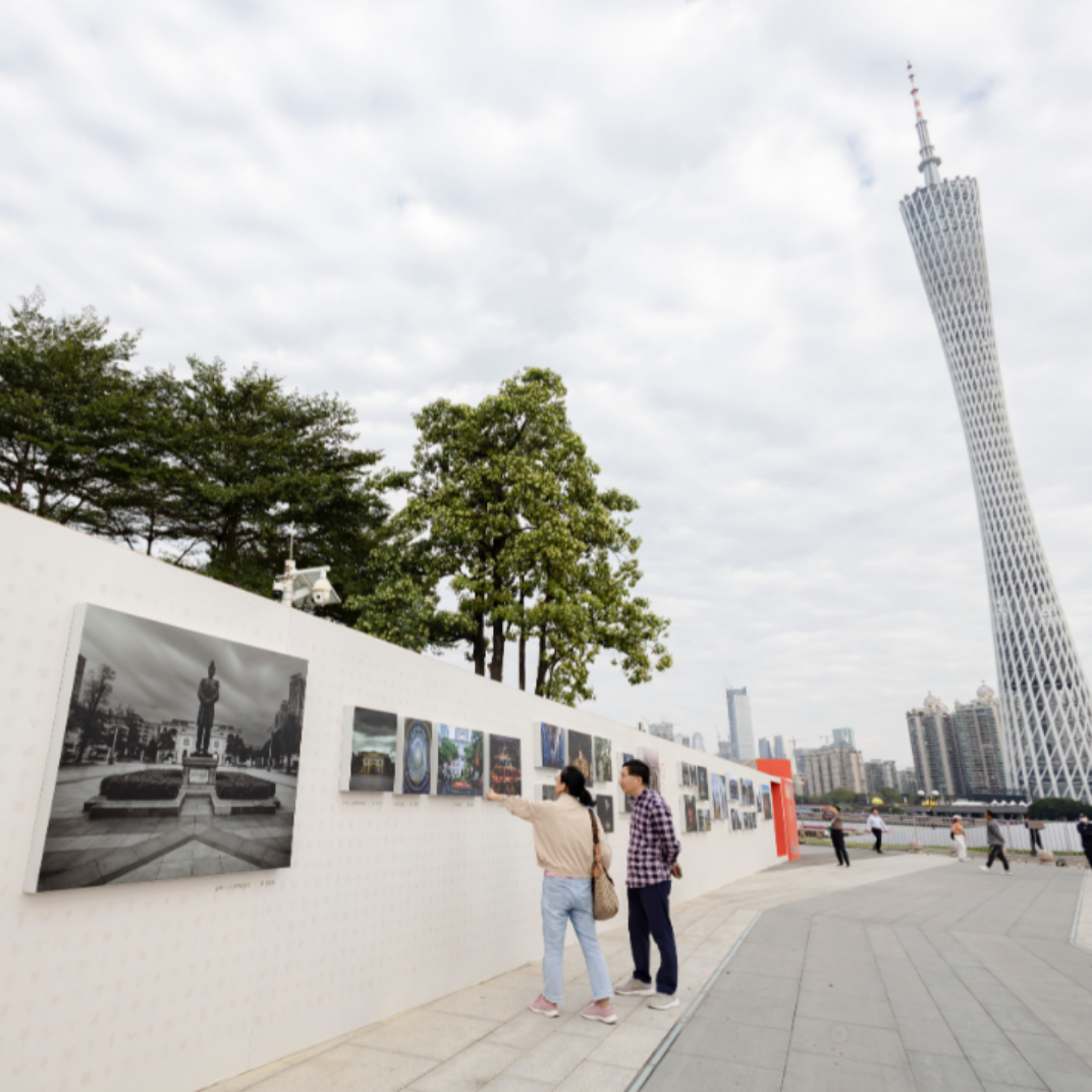 Photo exhibition unfolds Guangzhou's hundred years of development