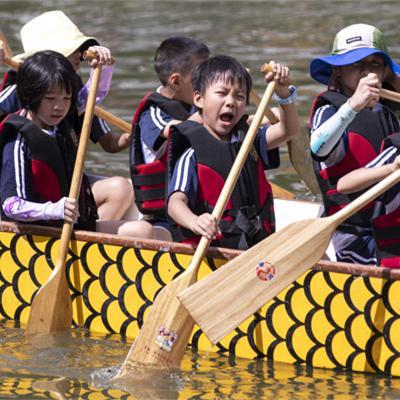 Dragon boat summer camp opens in Tianhe
